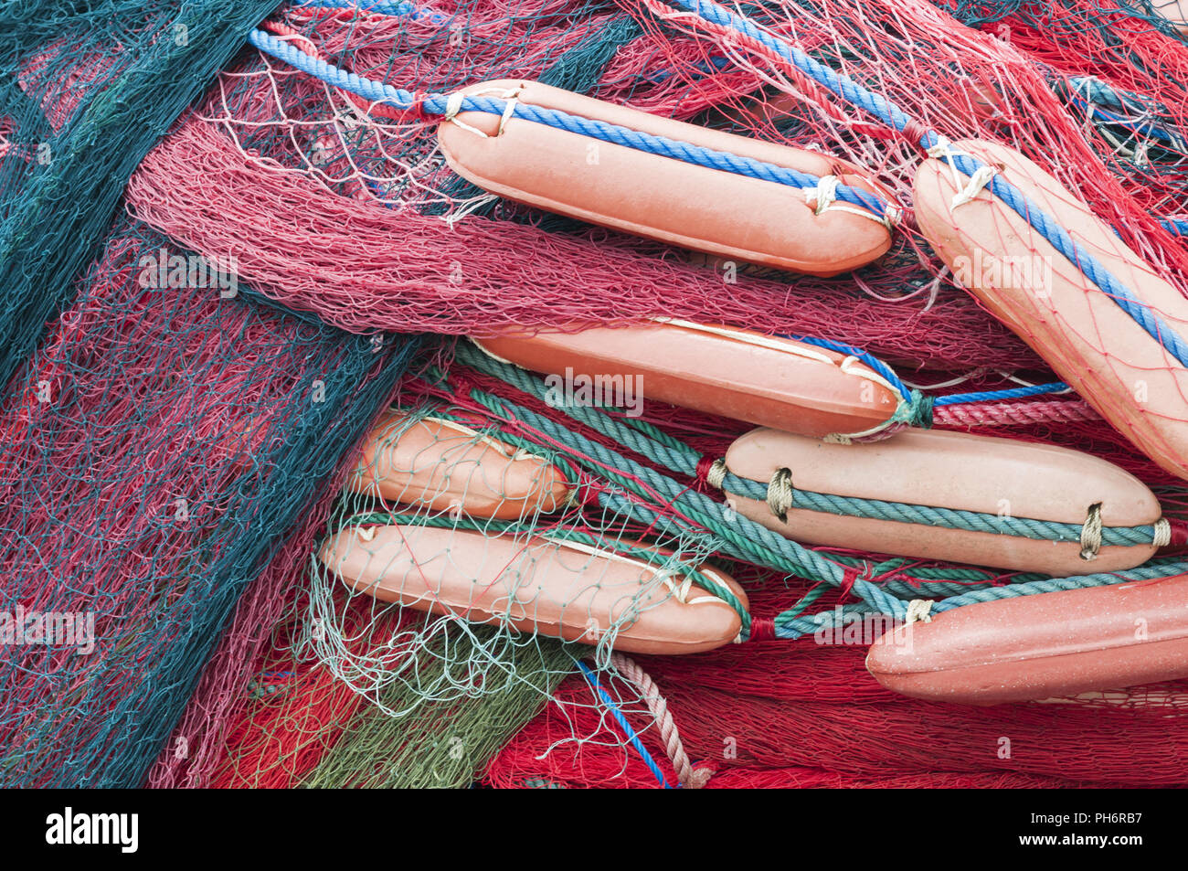 Piles of fishing nets Stock Photo Alamy