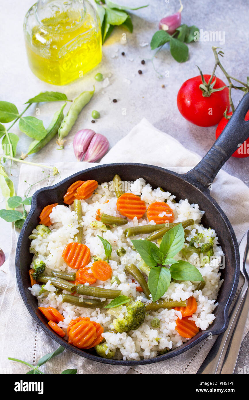 Healthy food Fried rice with vegetables. Prepared and served in a cast