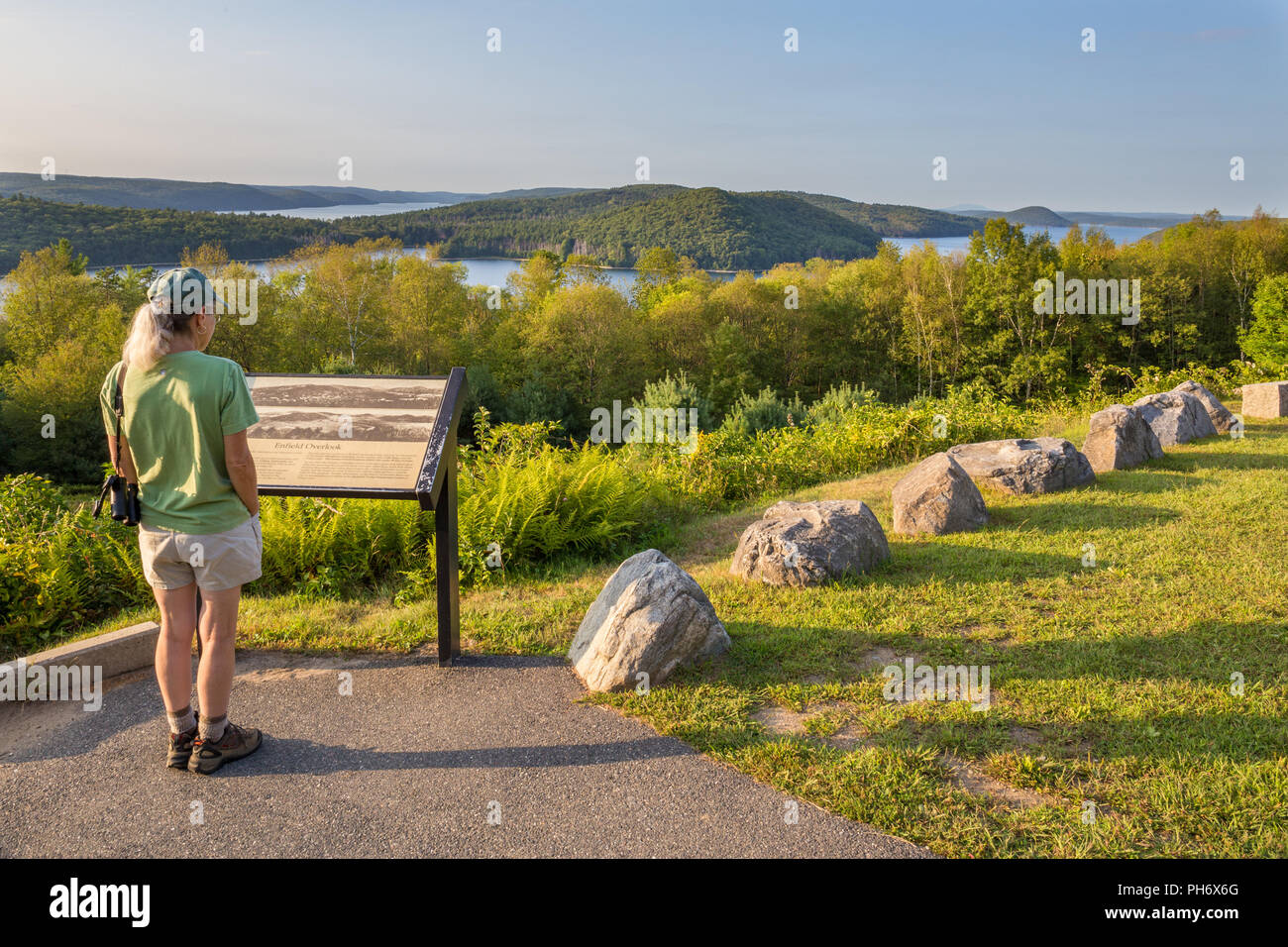 Woman viewing the Quabbin Reservoir, Ware, Massachusetts from the Enfield Lookout Stock Photo