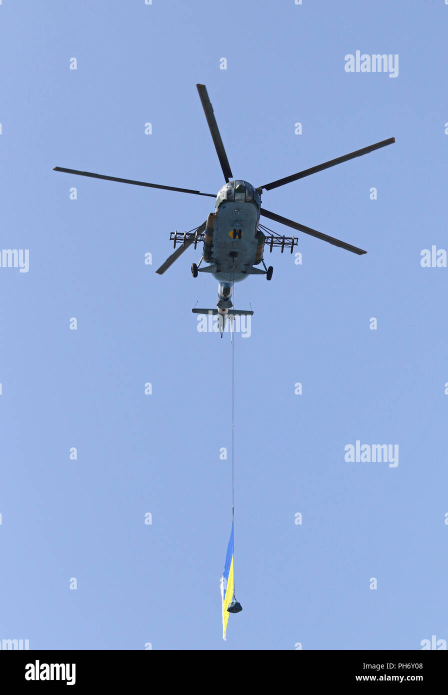 KYIV, UKRAINE - AUGUST 24, 2018: Ukrainian military helicopters fly over the Independence Square in Kyiv during the military parade, dedicated to the  Stock Photo