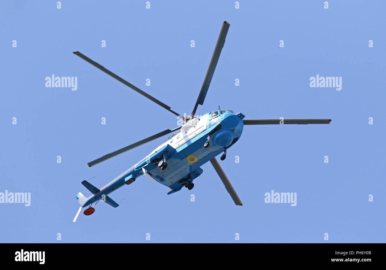 KYIV, UKRAINE - AUGUST 24, 2018: Ukrainian military helicopters fly over the Independence Square in Kyiv during the military parade, dedicated to the  Stock Photo
