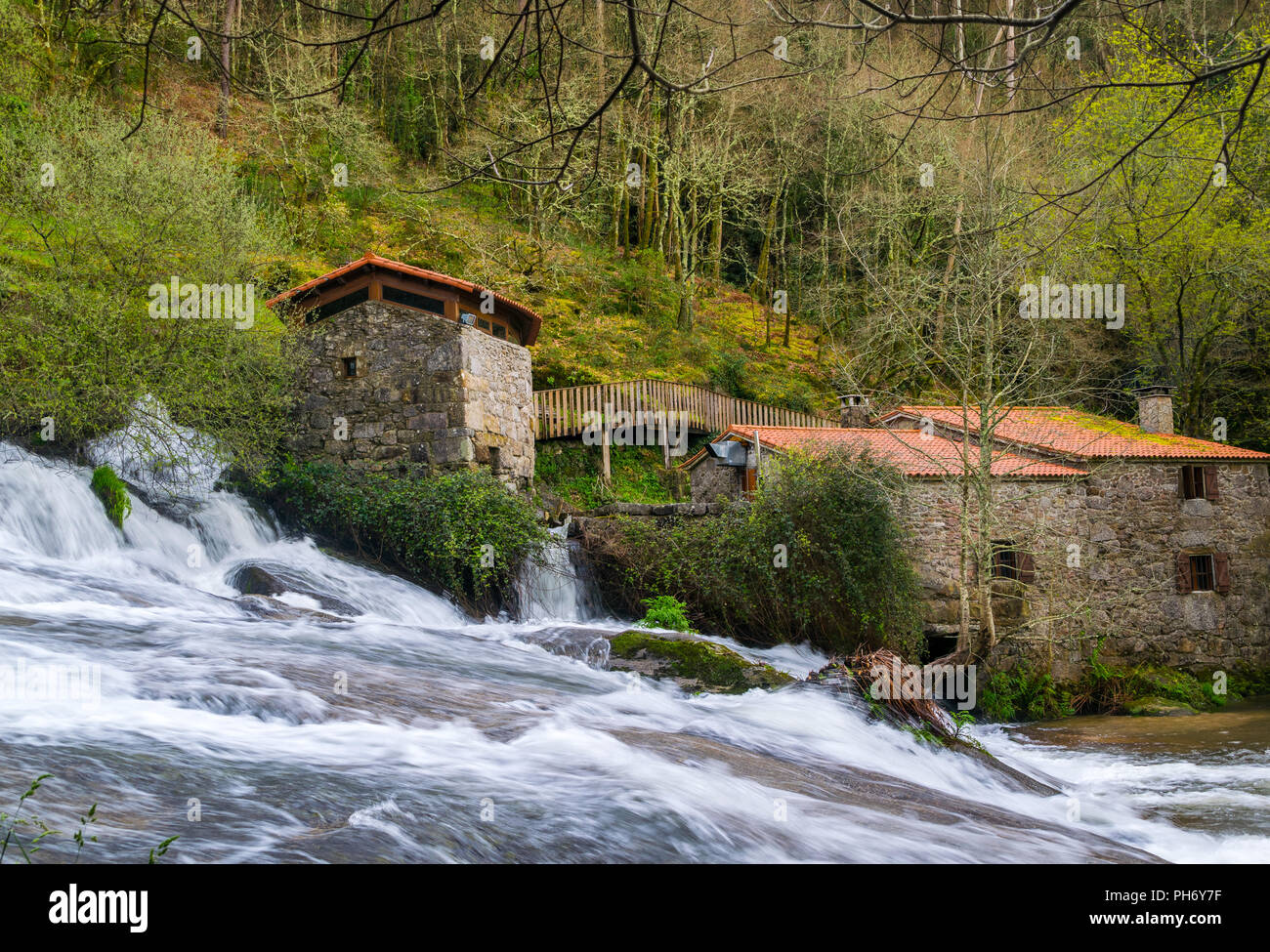 Waterfall and old water mills in galicia, Spain. Natural Park Barosa river Stock Photo