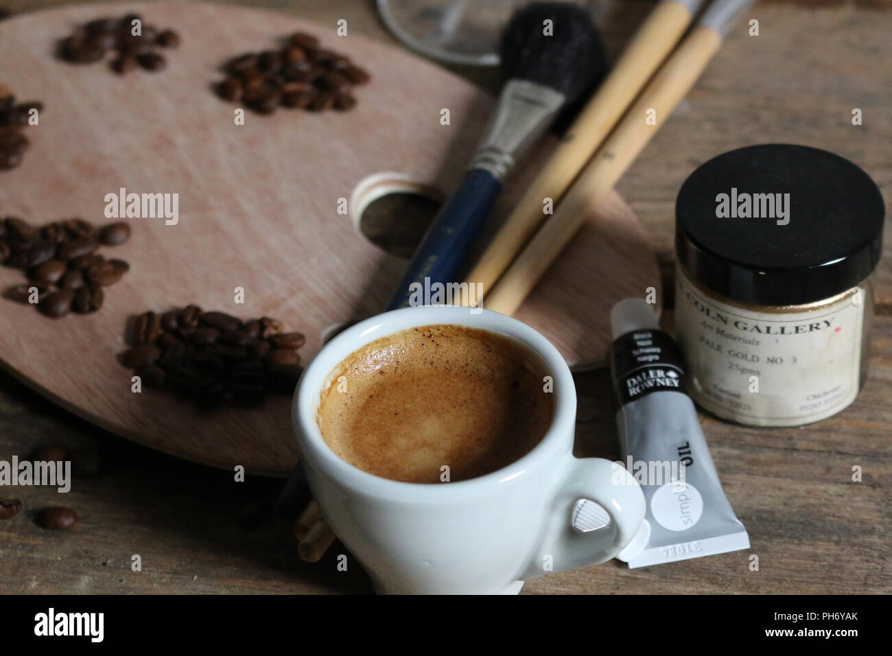 Coffee beans on artists palette,exploring the concept of creating the perfect coffee blend Stock Photo