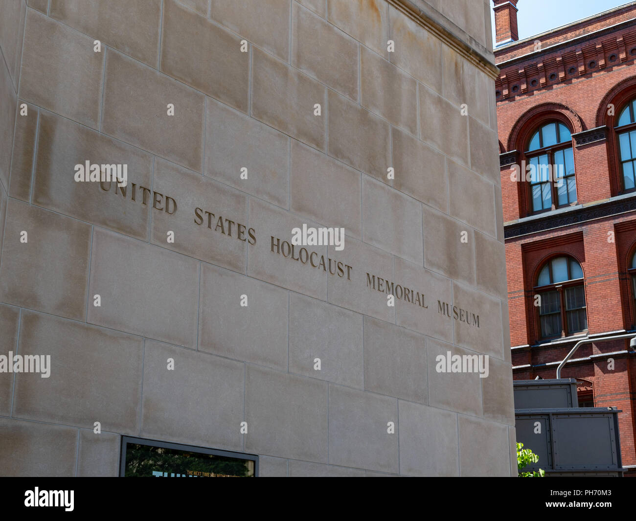 United States Holocaust Memorial Museum entrance sign outside of building   Stock Photo