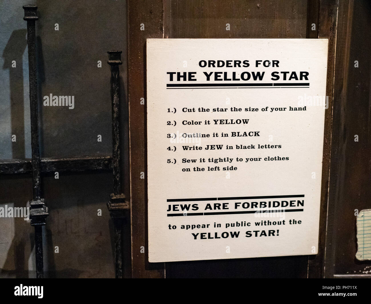 Orders for yellow star Jewish notice recreated from Nazi era Germany  Stock Photo