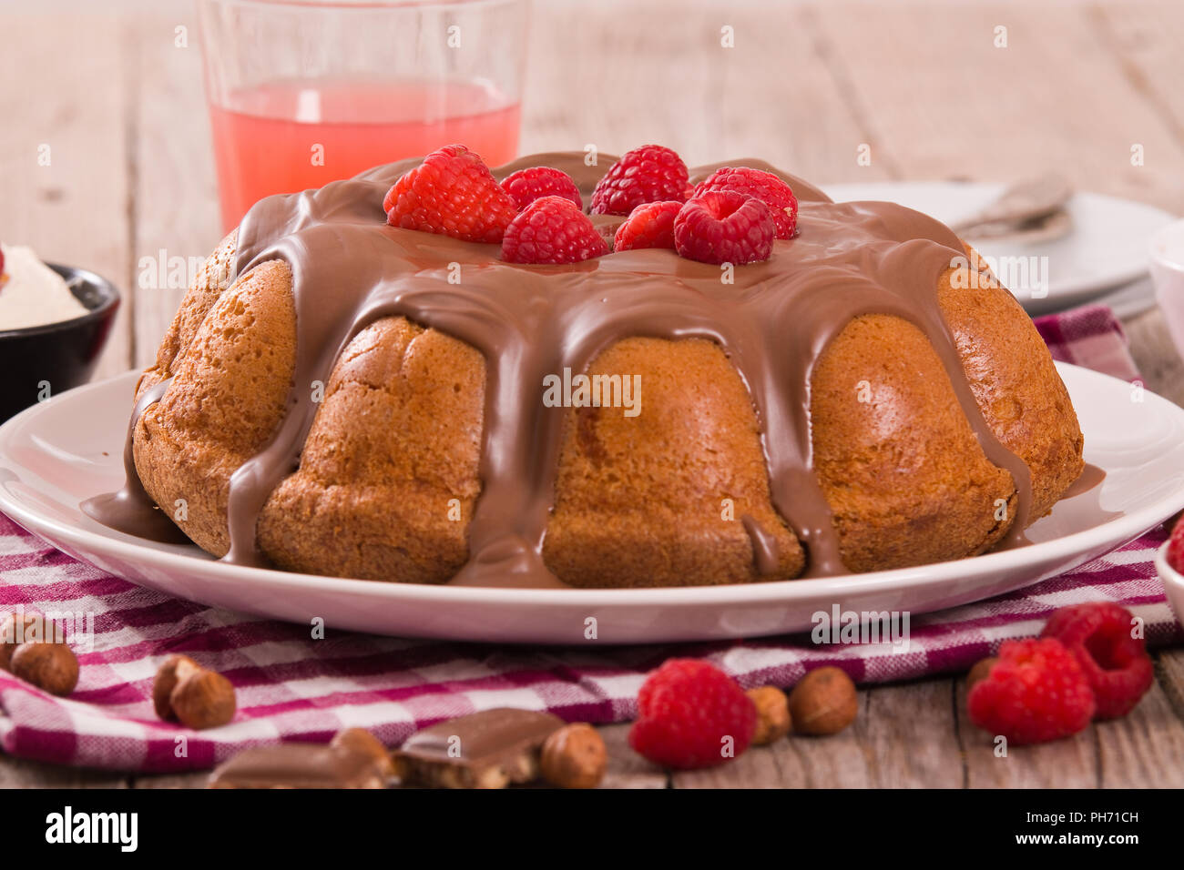 Chocolate cake with raspberries Stock Photo - Alamy