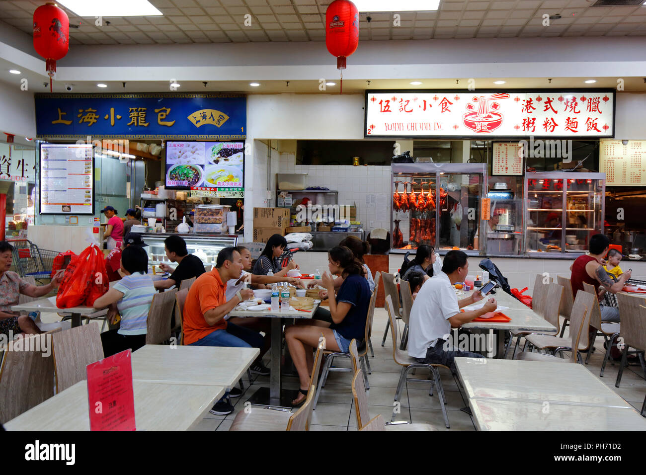 Food vendors inside Fei Long Market food court, 6301 8th Ave, Brooklyn, New York City Stock Photo