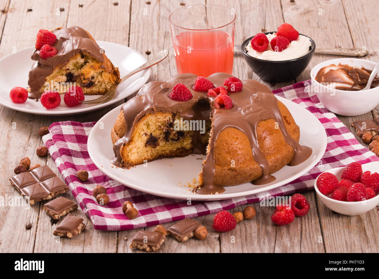 Chocolate cake with raspberries Stock Photo - Alamy