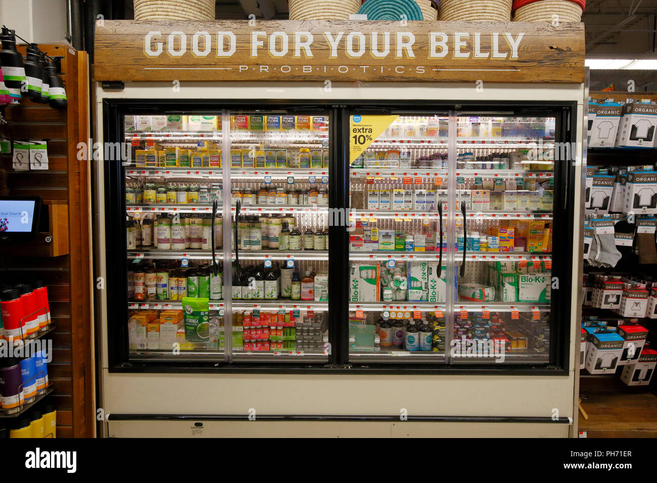 A refrigerator full of probiotics and superfoods at a Whole Foods Market Stock Photo