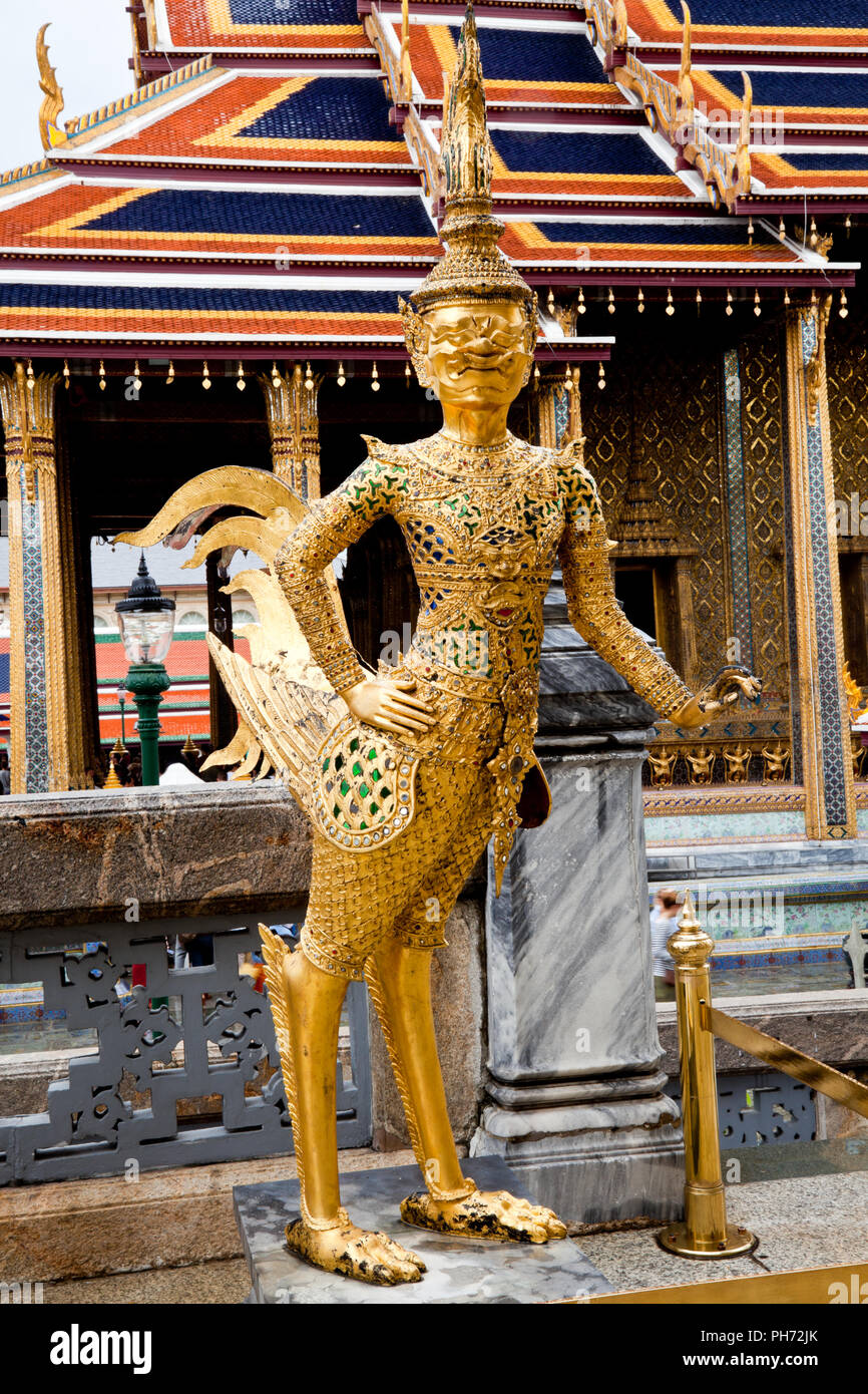 Statue in emerald buddha temple Stock Photo