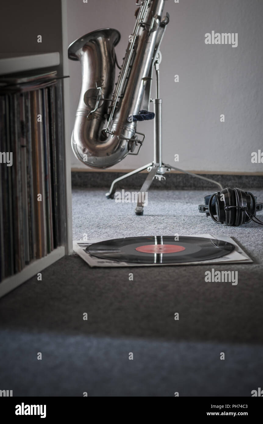 Lifestyle, Still Life with records, saxophone with headphones Stock