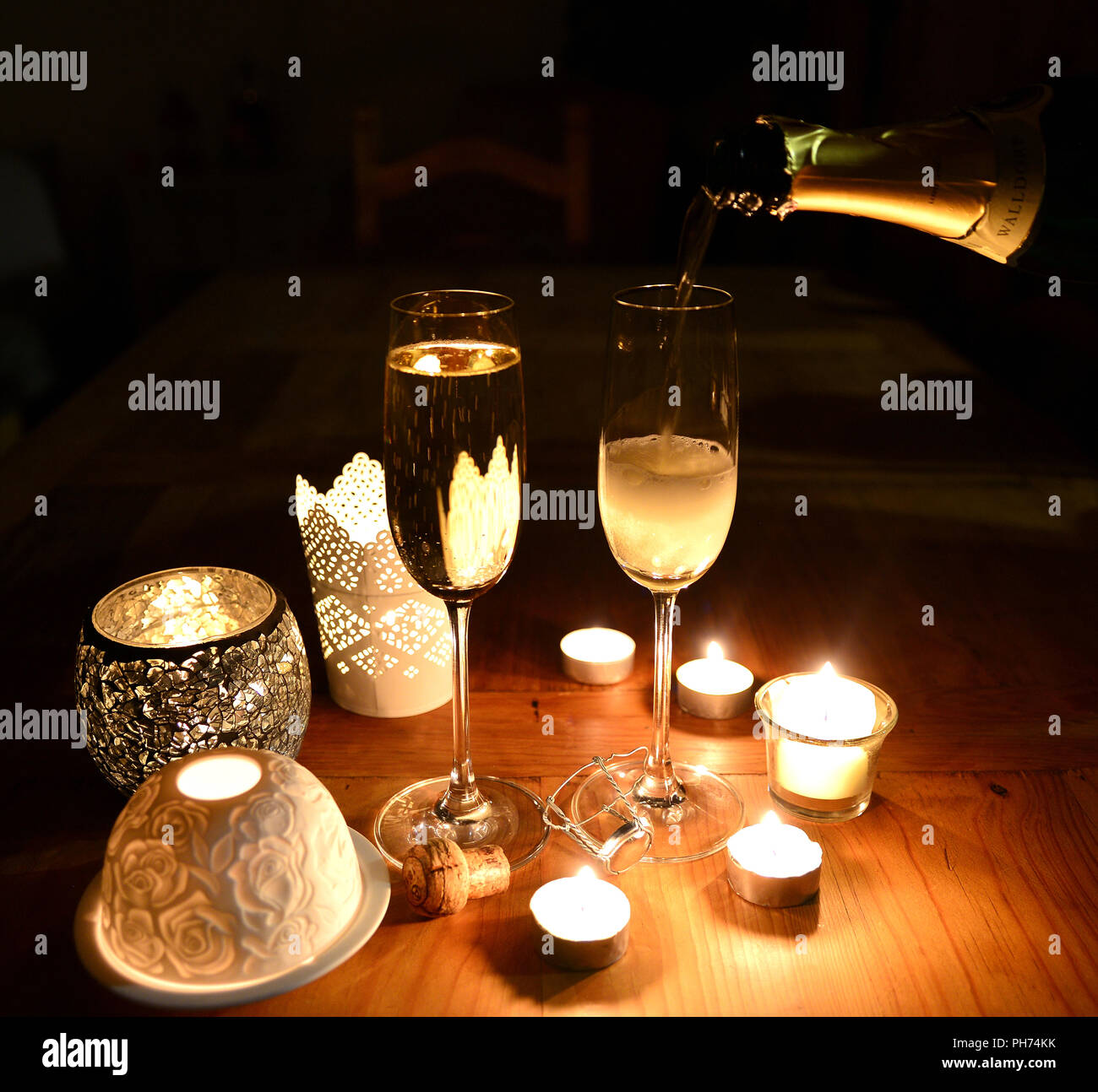 Sparkling candle light dinner Stock Photo Alamy