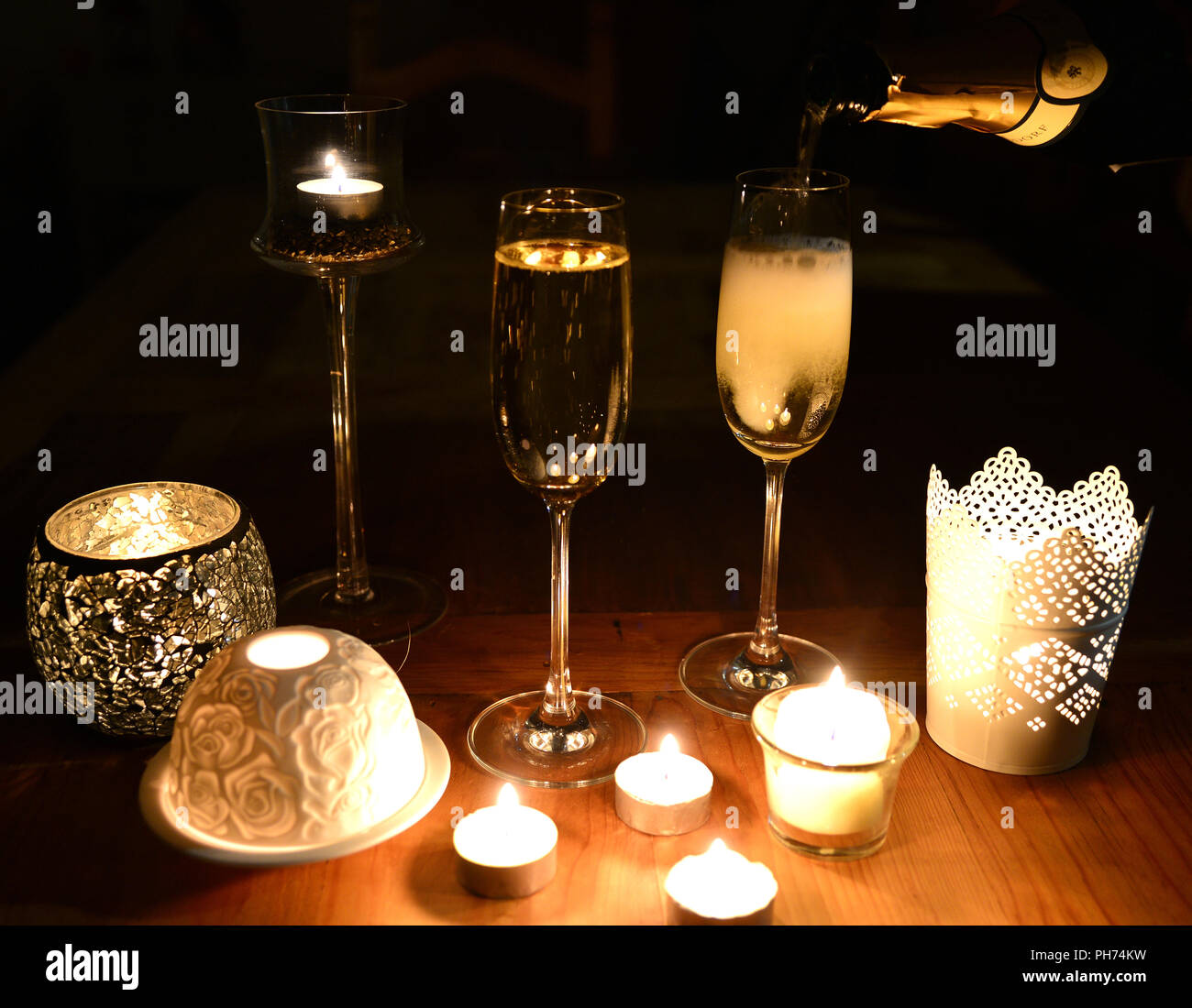 Sparkling candle light dinner Stock Photo Alamy