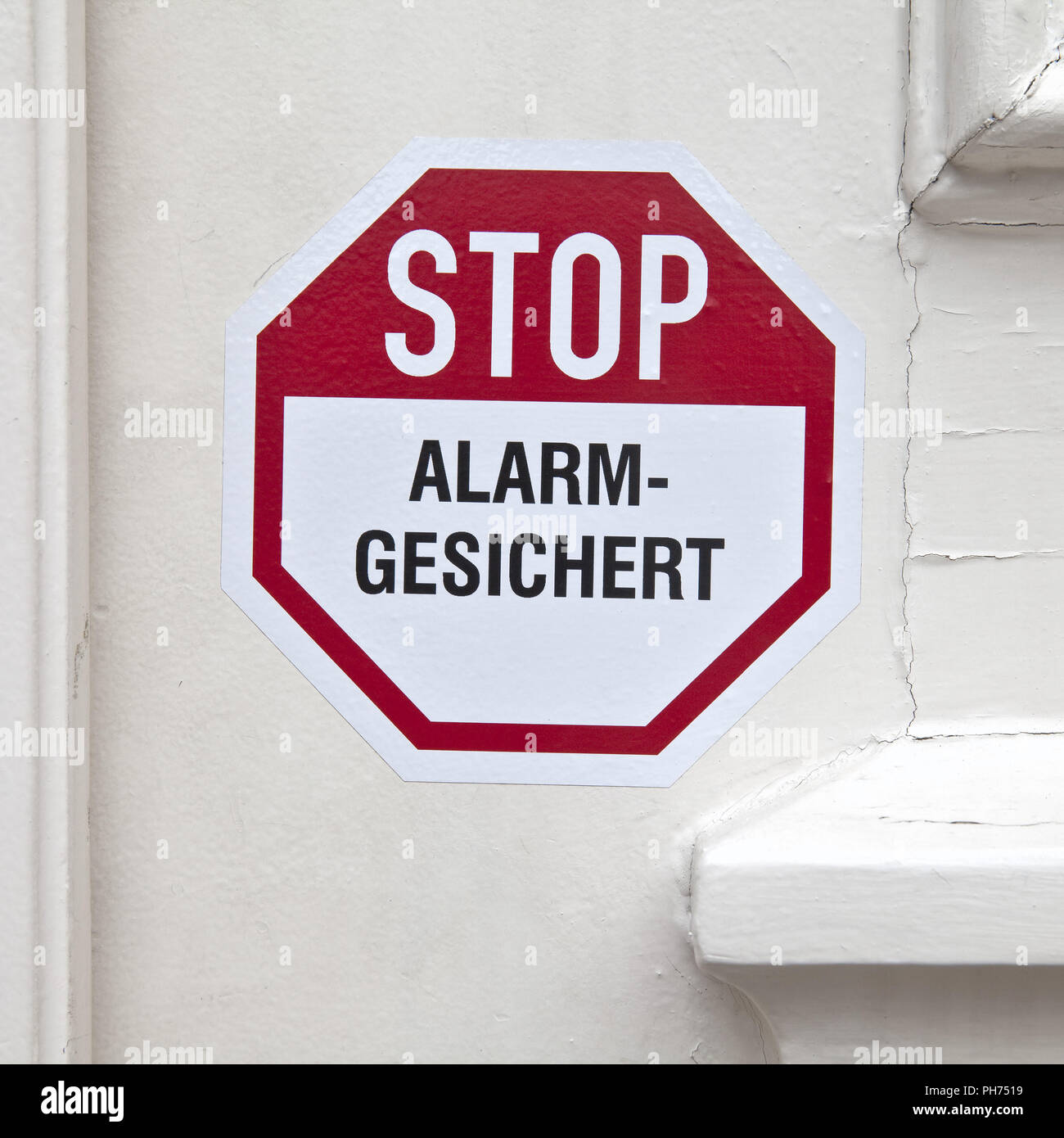 Sticker on the door stop alarm Stock Photo Alamy