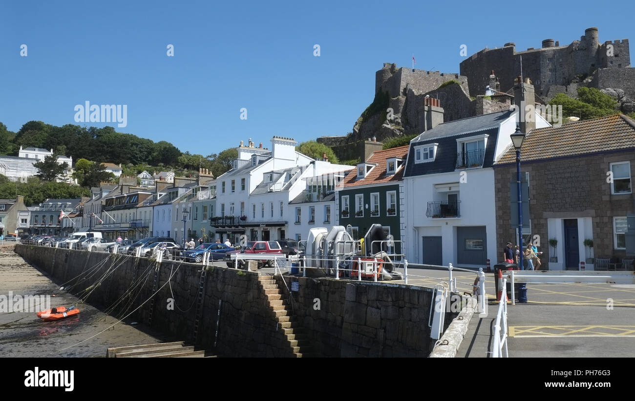 Gorey with Mont Orgueil Castle, Jersey Stock Photo - Alamy