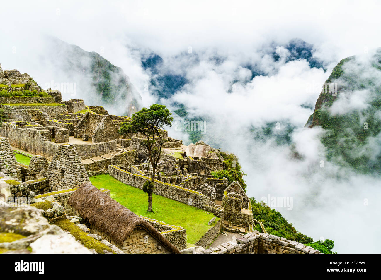 Machu Picchu and the clouds Stock Photo - Alamy