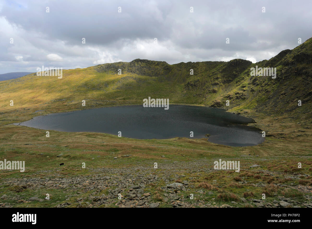 Striding Edge ridge on the way to Helvellyn fell, Lake District ...