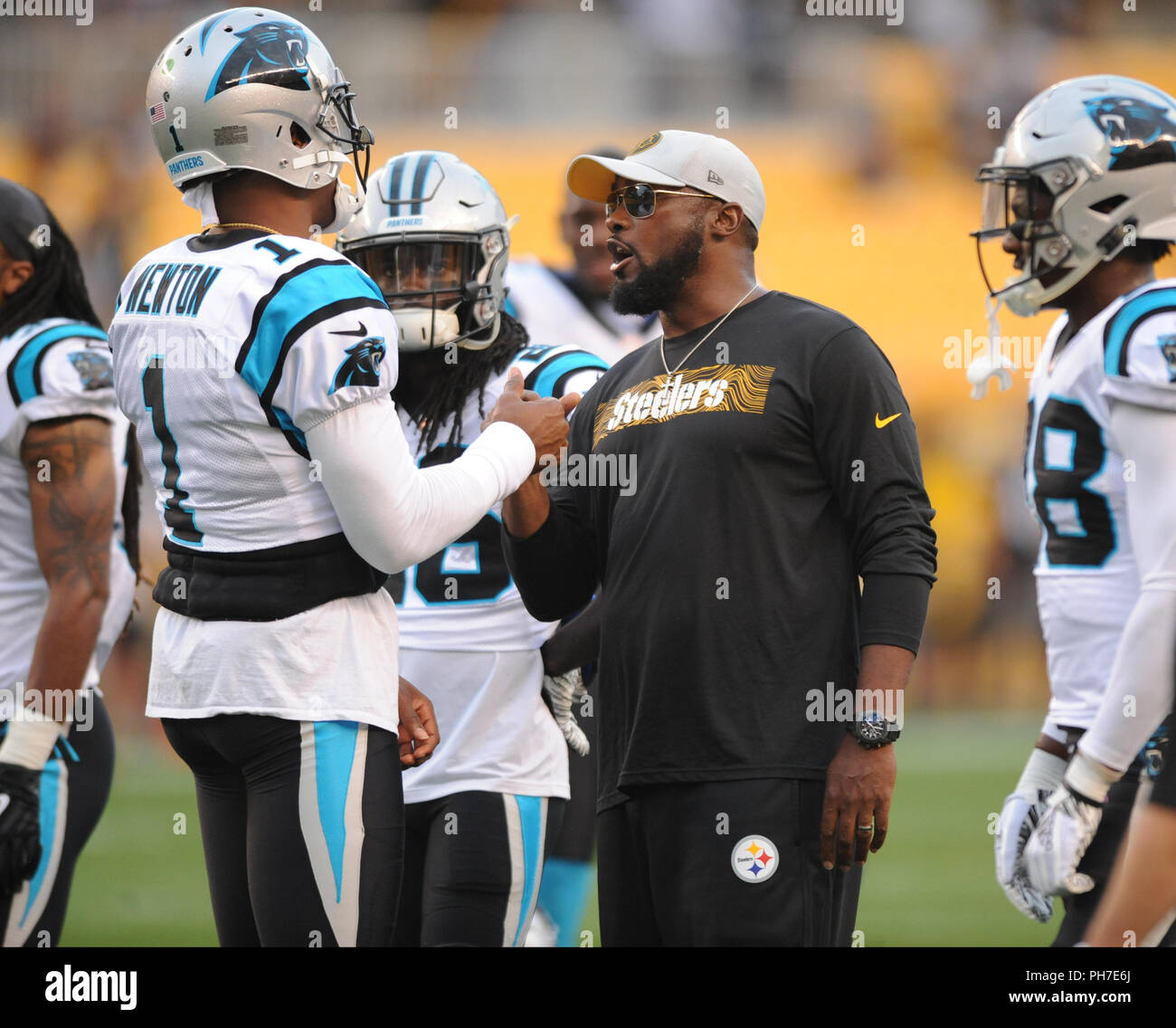 Pittsburgh, USA. 30th Aug 2018. August 30th, 2018: Panthers #1 Cam Newton,  and Steelers Head Coach Mike Tomlin during the Pittsburgh Steelers vs  Carolina Panthers game at Heinz Field in Pittsburgh, PA.