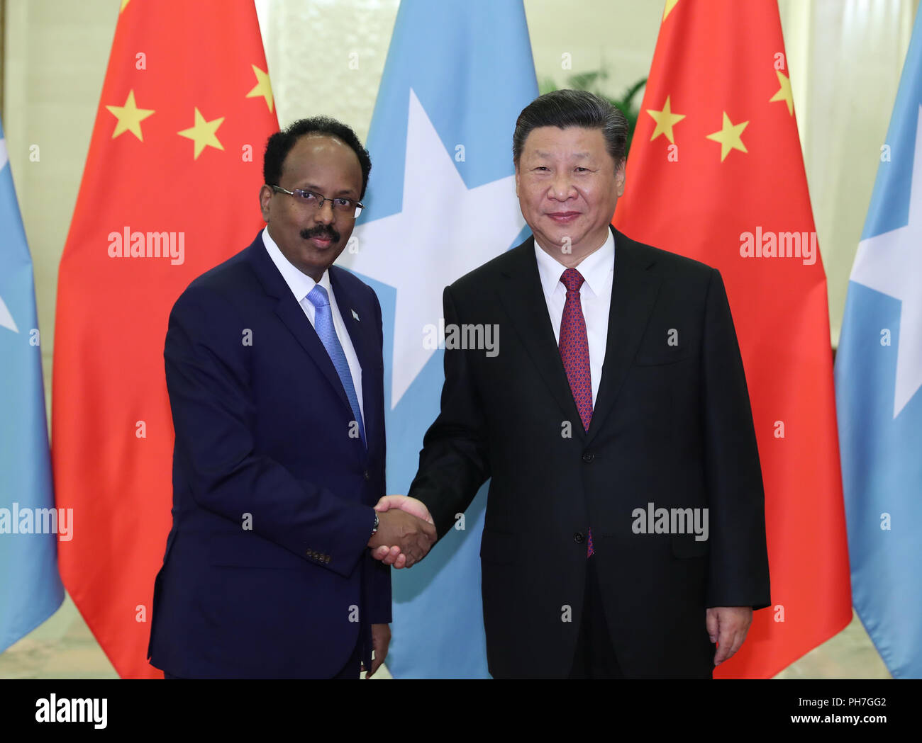 Beijing, China. 31st Aug, 2018. Chinese President Xi Jinping (R) meets with Somali President Mohamed Abdullahi Mohamed at the Great Hall of the People in Beijing, capital of China, Aug. 31, 2018. Credit: Ding Lin/Xinhua/Alamy Live News Stock Photo