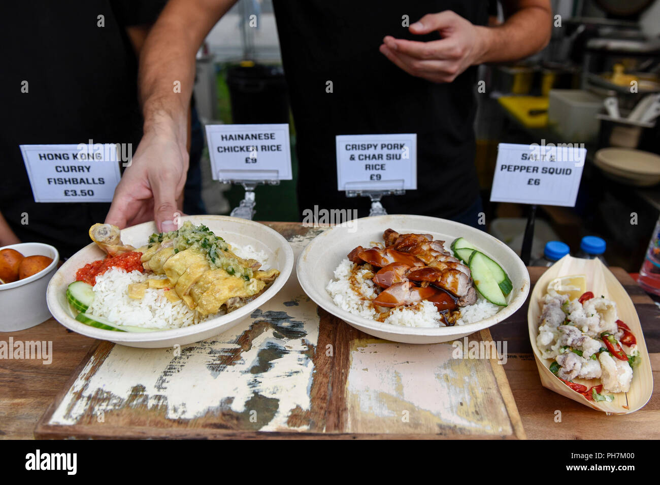London, UK.  31 August 2018. Dishes are prepared on the opening day of the three day Chinese Food Festival at Potters Fields Park next to City Hall.  As well as food and drink from different parts of China freshly prepared for visitors to try, there are cooking demonstrations and presentations by the UK Han Culture Association.  Credit: Stephen Chung / Alamy Live News Stock Photo