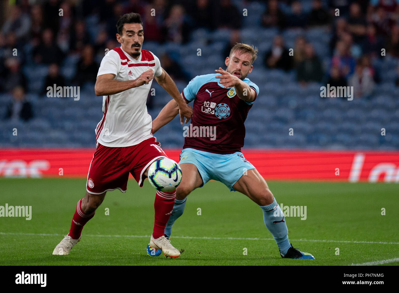 Burnley, UK. 30th August 2018. Olympiacos's Lazaros Christodoulopoulos in  action during todays match 30th August 2018, Turf Moor, Burnley, England;  UEFA Europa League, Play off leg 2 of 2, Burnley v Olympiacos