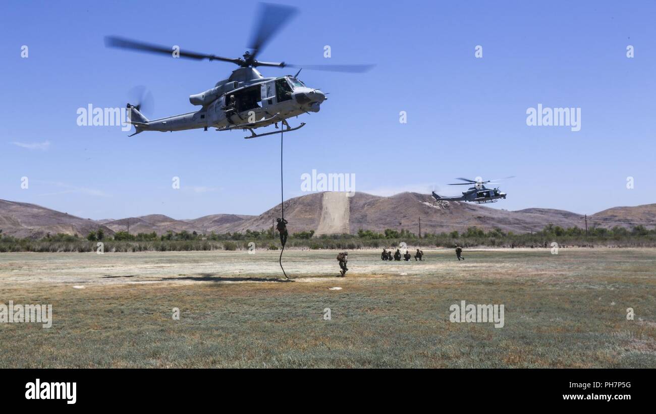 Marines with Marine Light Attack Helicopter Squadron (HMLA) 369 insert ...
