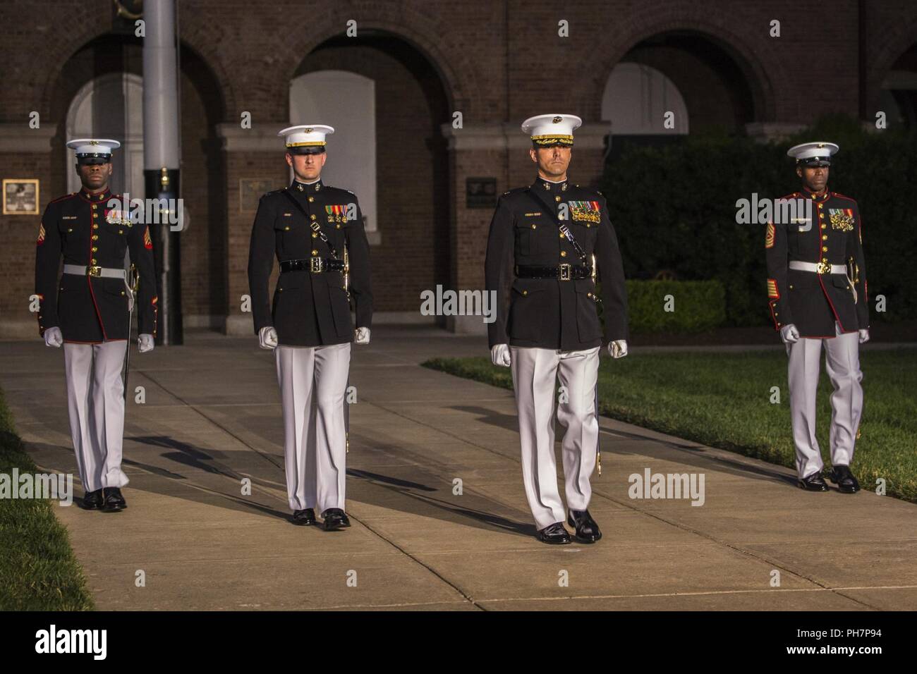 Marines with the Marine Barracks Washington D.C. parade marching staff ...