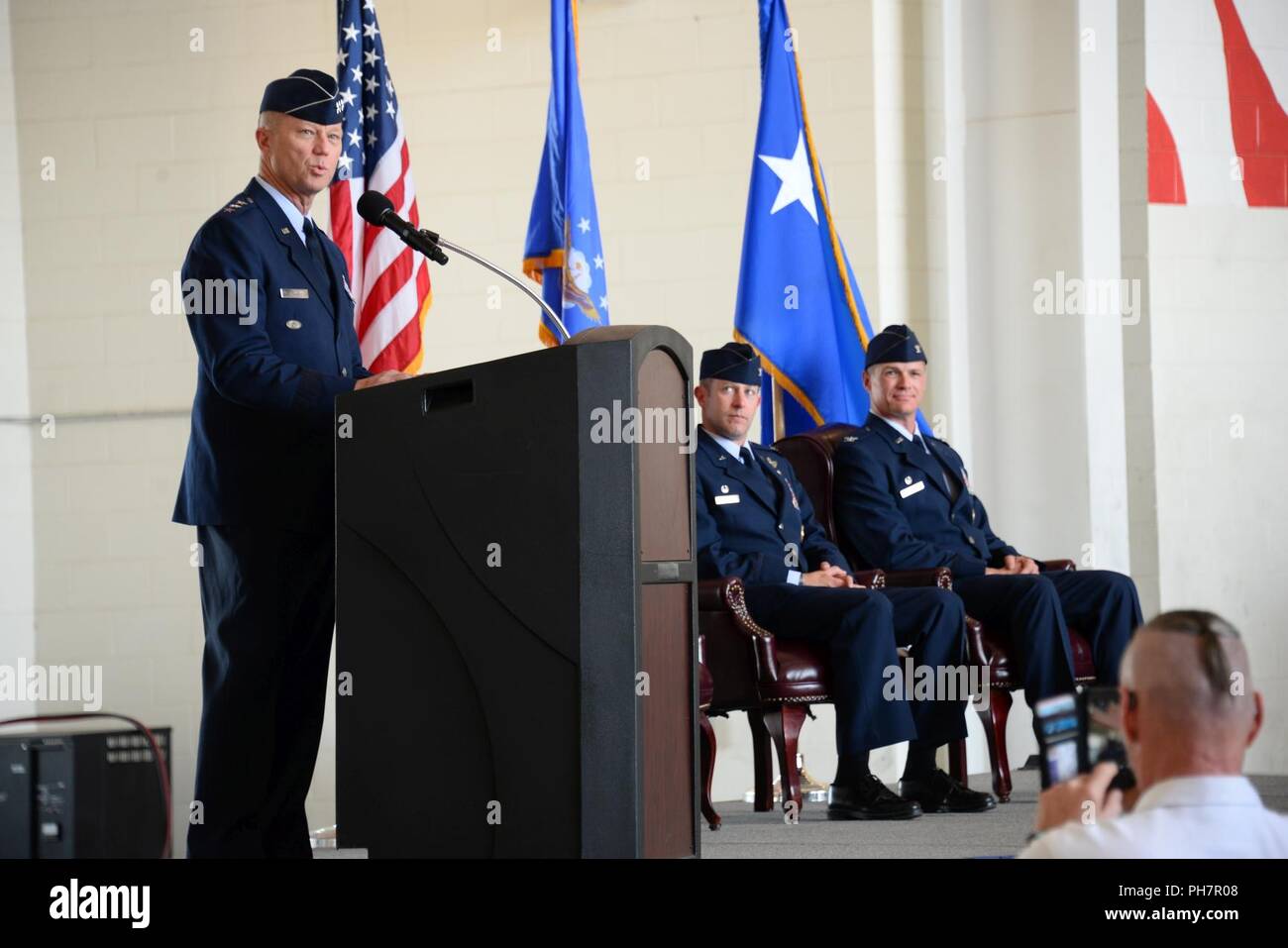 U.S. Air Force Lt. Gen. Mark D. Kelly celebrates the accomplishements of Col. Scott C. Campbell during a change of command ceremony at Davis-Monthan Air Force Base, Ariz., June 29, 2018. During the ceremony, Campbell relinquished command to Col. Mike Drowley. Stock Photo