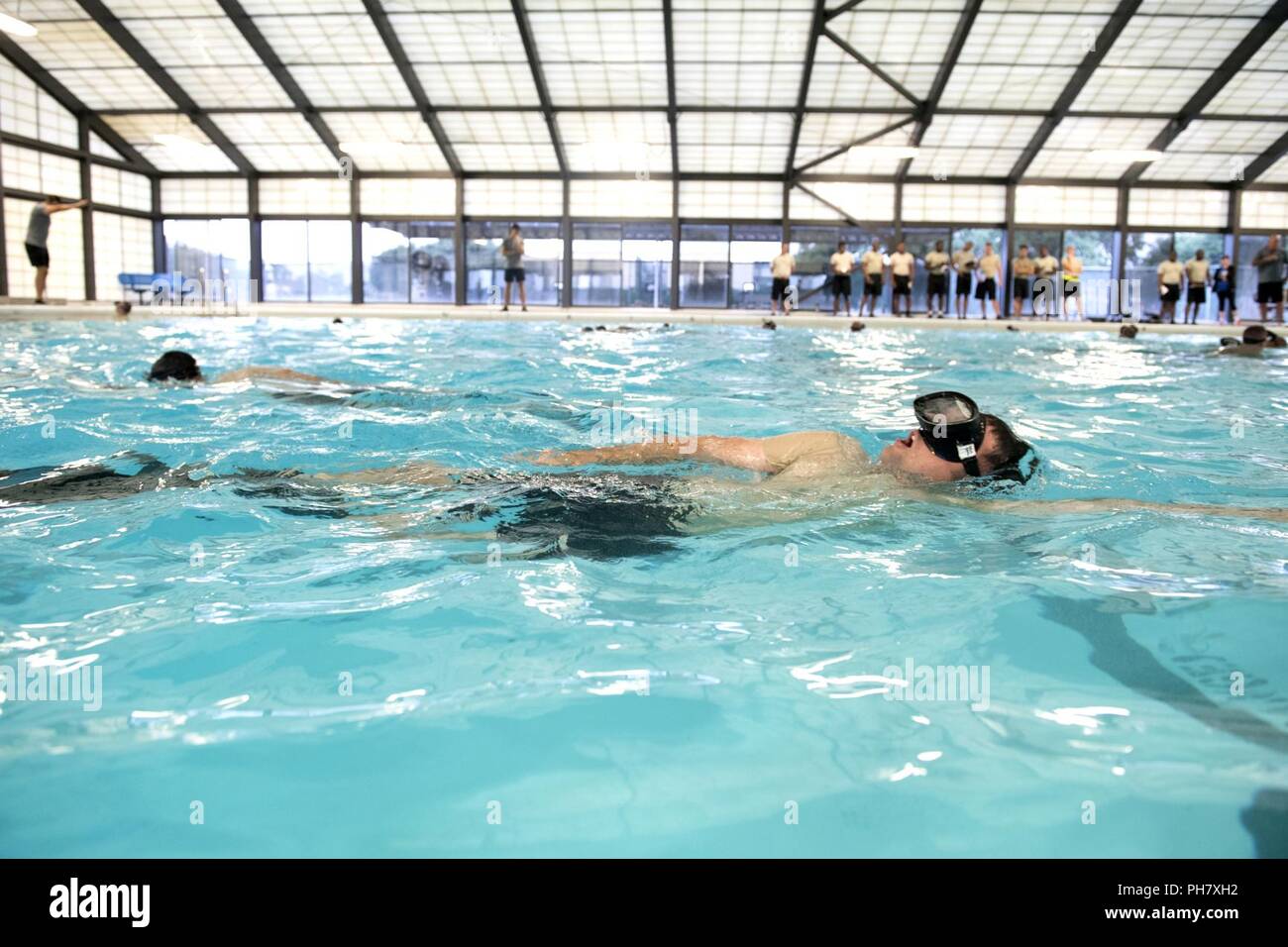 An Air Force Special Operations recruiter swims laps during a 350th Battlefield Airman Training Squadron preparatory course at Joint Base San Antonio-Lackland in San Antonio, Texas June 27, 2018. The recruiters experienced many of the same challenges the squadron presents to their recruits. Stock Photo