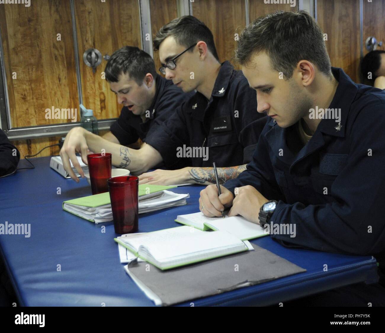 Sailors assigned to Unit Indiana (SSN 789) study for