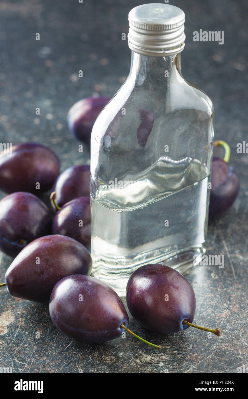 Plum brandy and plums. Tasty slivovitz Stock Photo Alamy