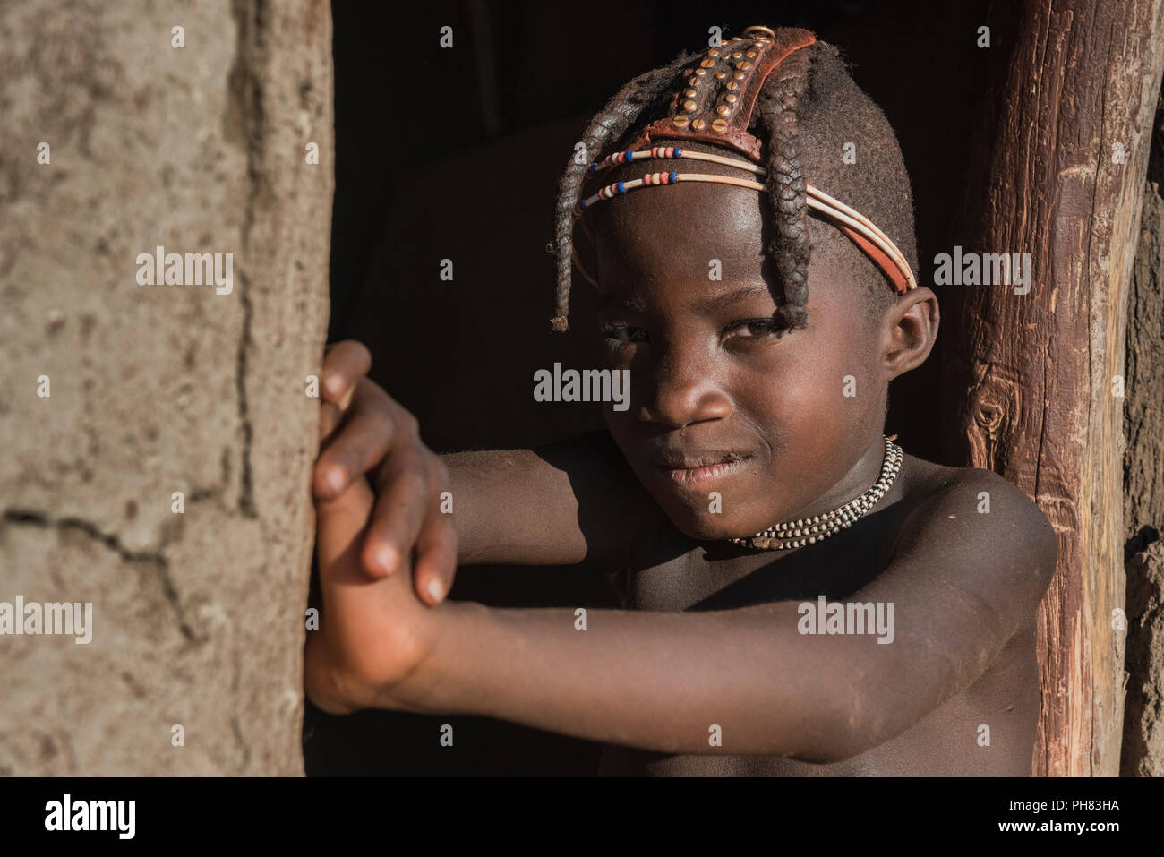 Ovahimba or Himba, boy with traditional headdress, portrait, Kunene district, Namibia Stock Photo