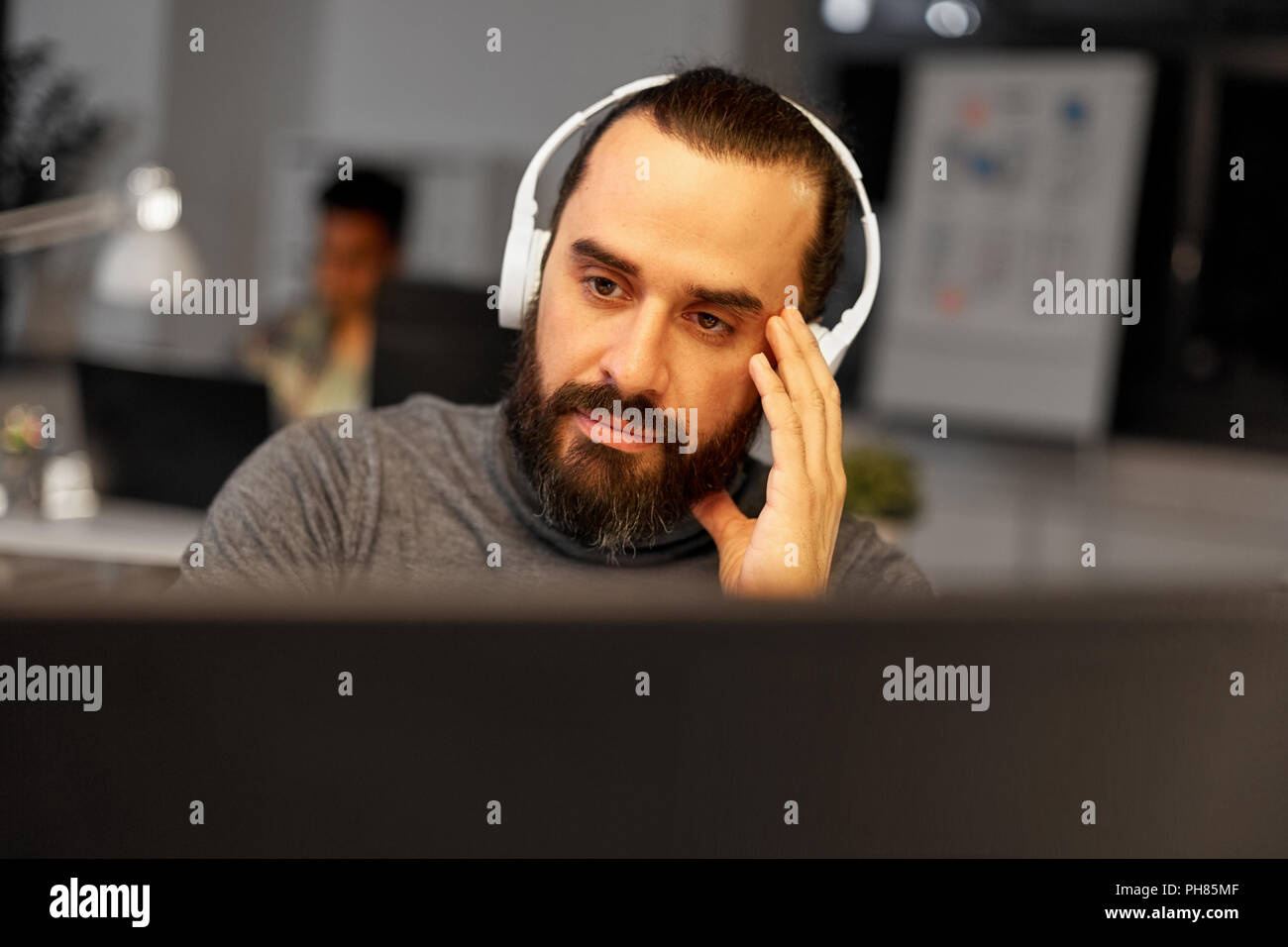 Middle eastern guy headphones hi-res stock photography and images - Alamy