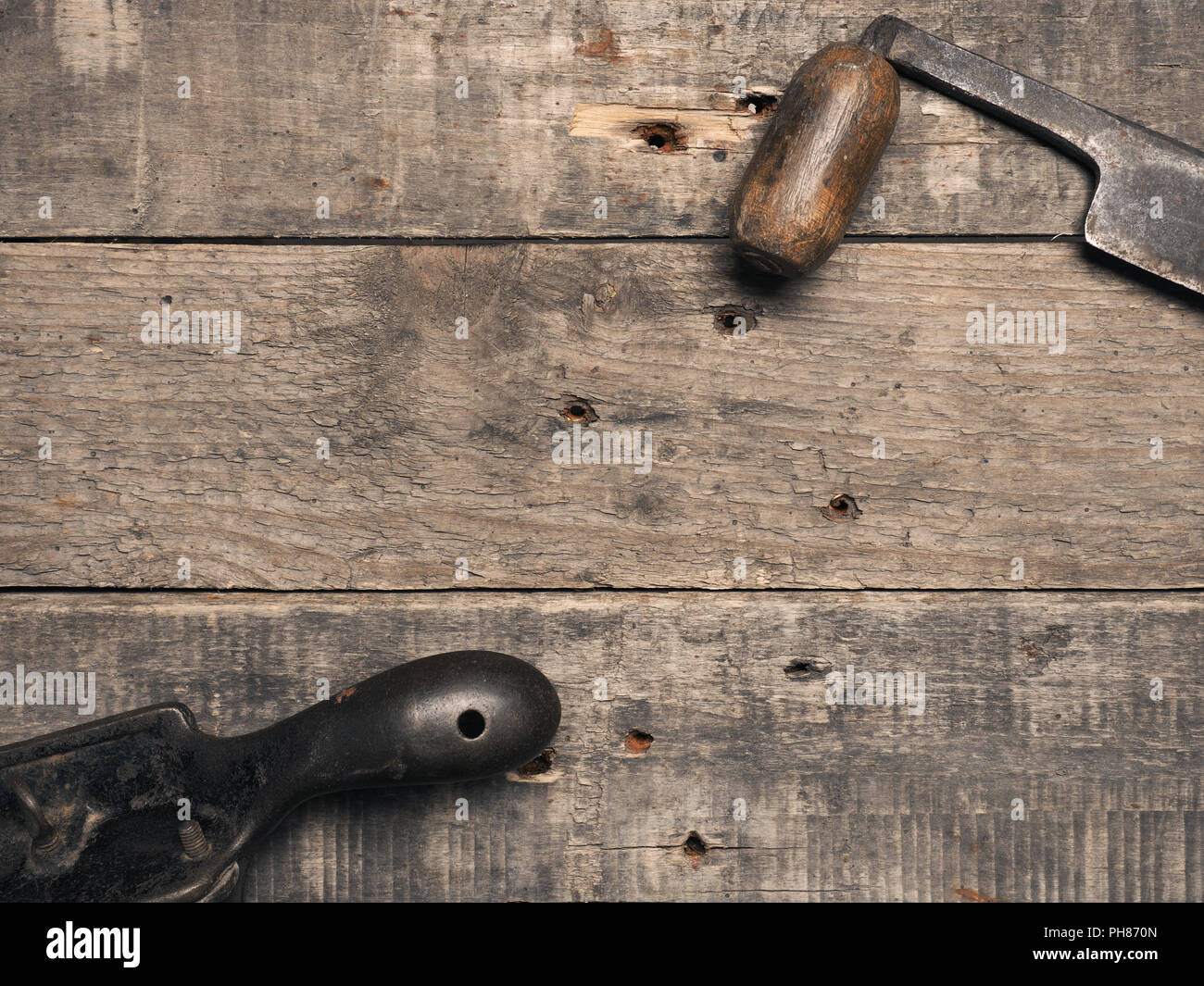 Carpenter tools on a rustic wooden background with space for text Stock Photo