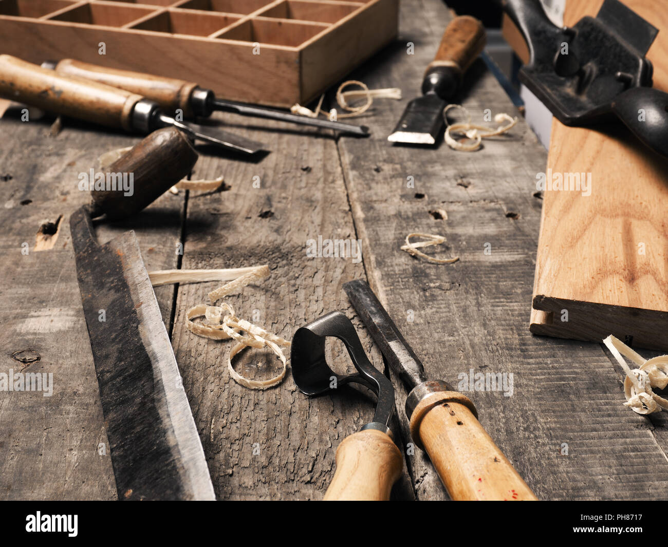 Carpenter tools on a rustic wooden background with space for text Stock Photo