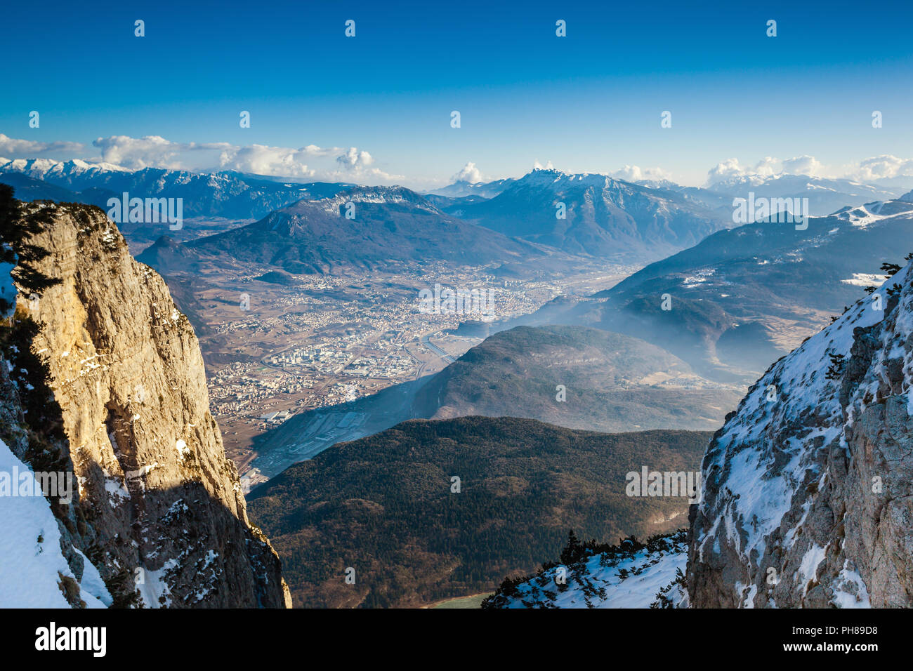 Aerial view on Trento from Paganella mountain in winter Stock Photo
