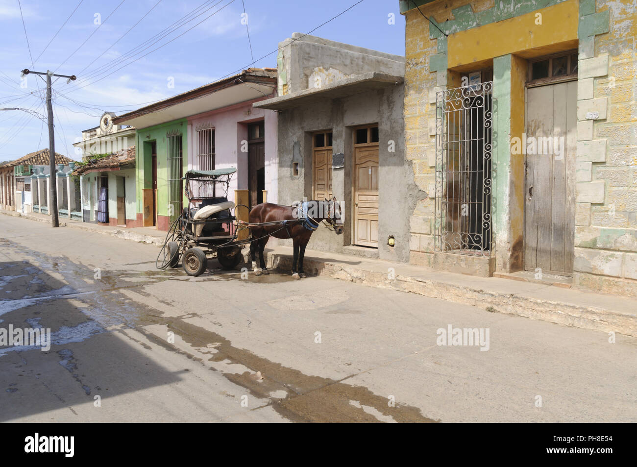 Horse and carriage on a street in Cuba Stock Photo