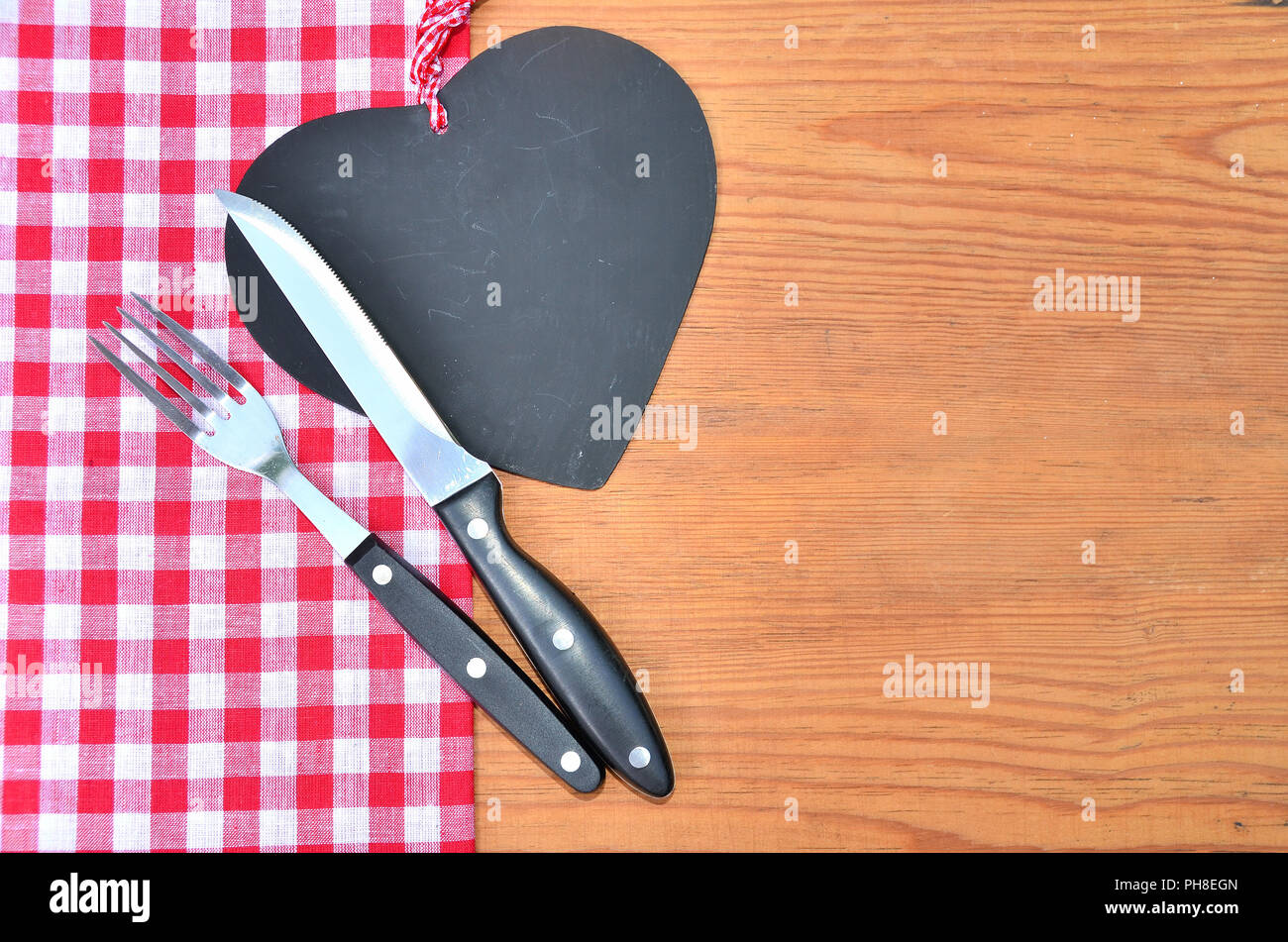 Red checkered cutlery rustic background Stock Photo Alamy