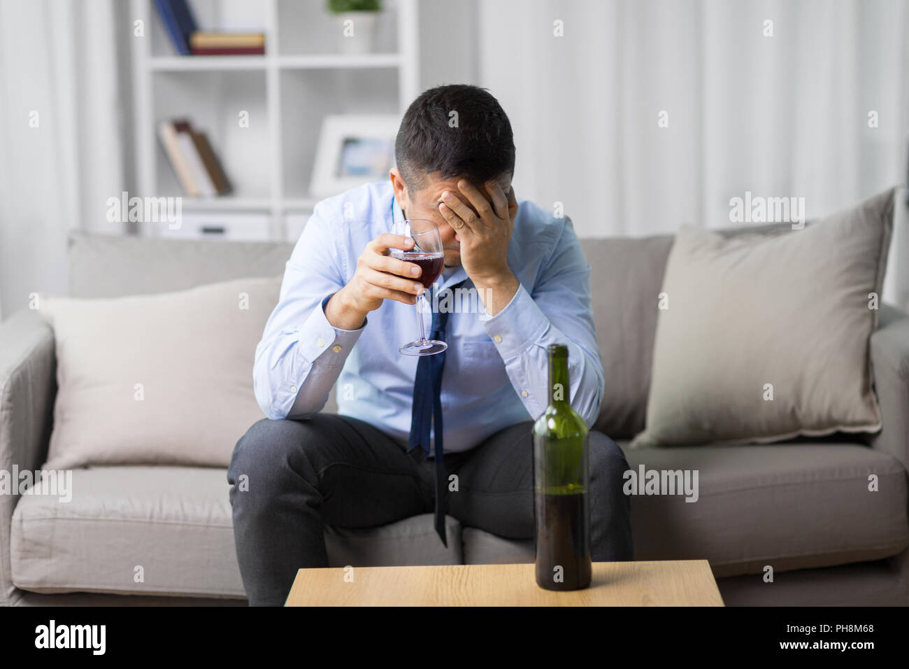 alcoholic drinking red wine at home Stock Photo