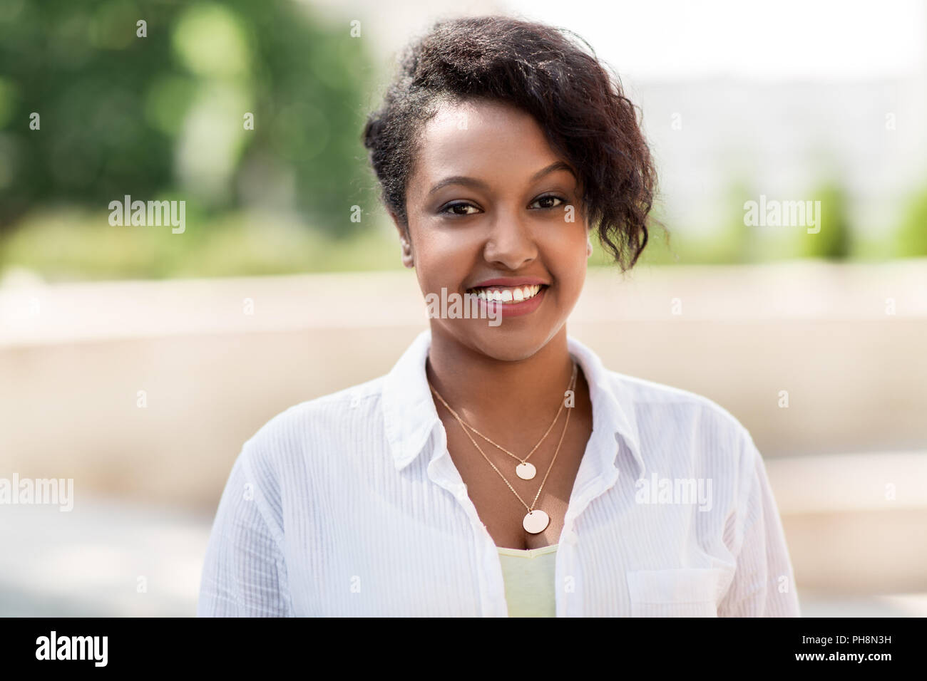 happy african american young woman outdoors Stock Photo - Alamy