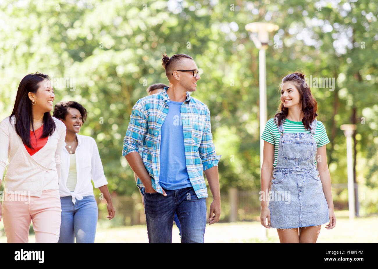 Man happy friends walking hi-res stock photography and images - Alamy