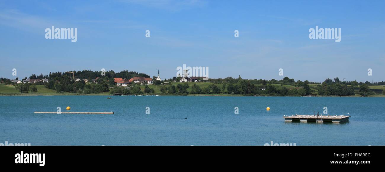 Idyllic village Seegraben and blue lake Pfaffikon Stock Photo