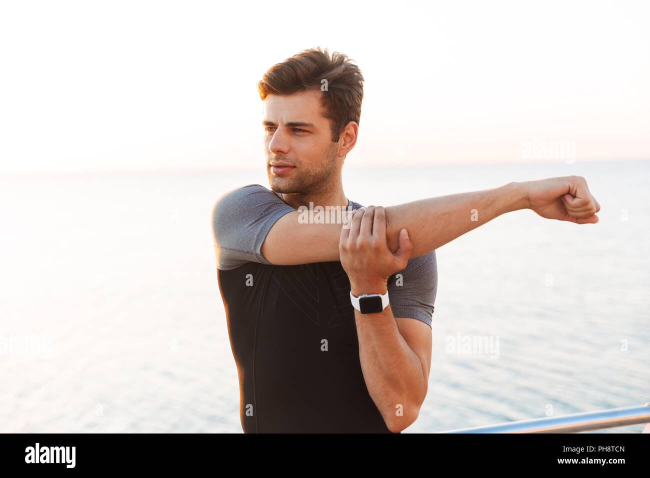 24,000+ Man Stretching Arms Stock Photos, Pictures & Royalty-Free Images -  iStock  Man stretching arms above head, Man stretching arms up, Black man stretching  arms