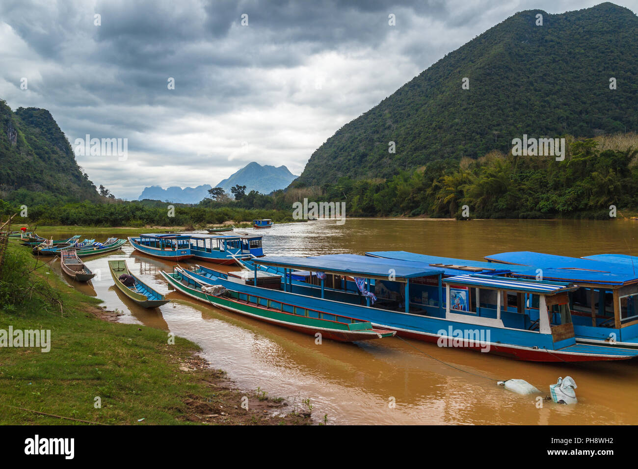 Traditional boats at Nam Ou river, Laos Stock Photo