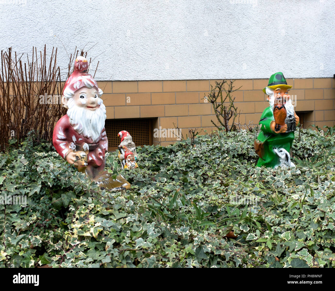 Garden gnomes in a German front yard Stock Photo