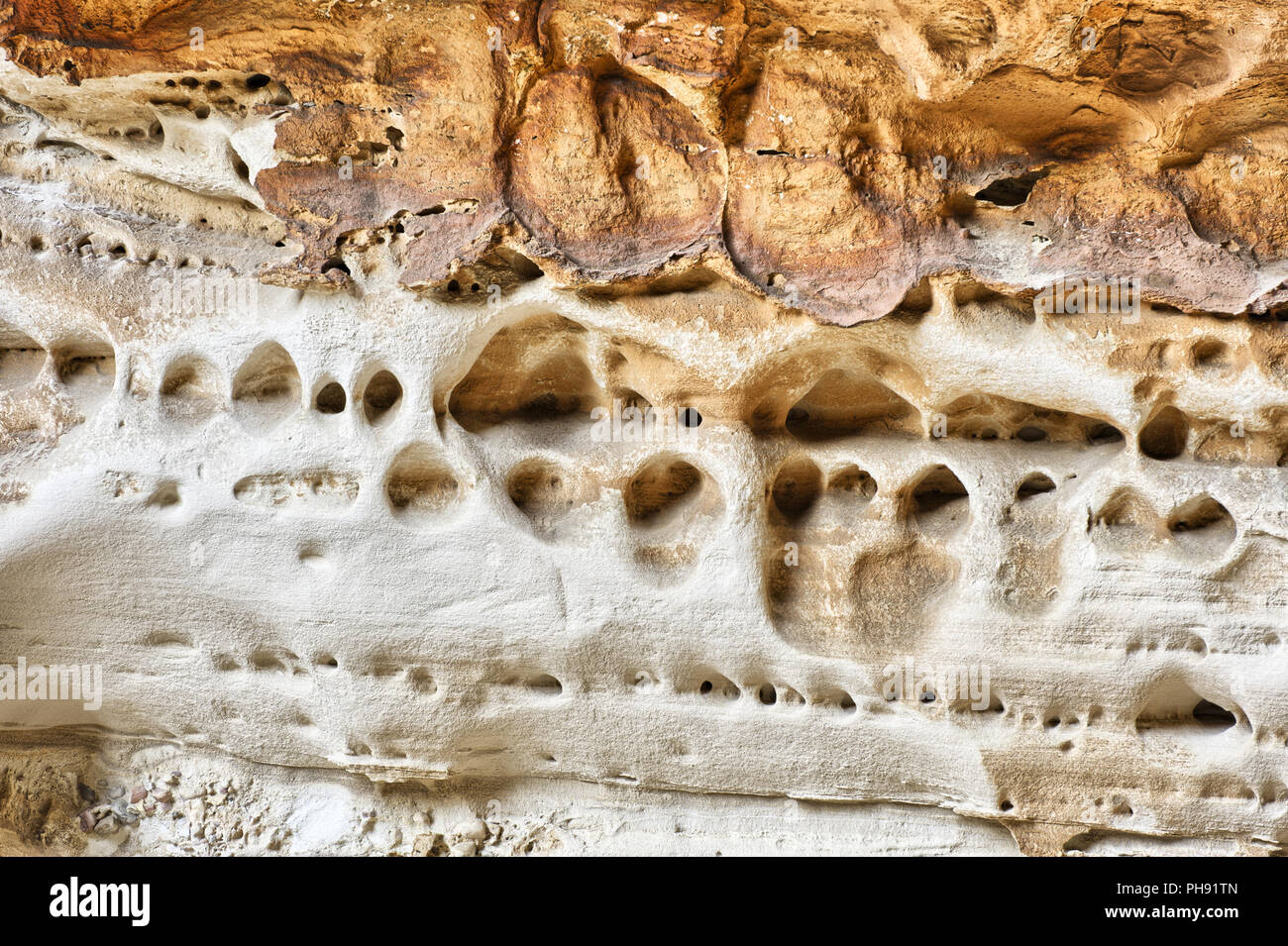 Eroded holes in sandstone hi-res stock photography and images - Alamy