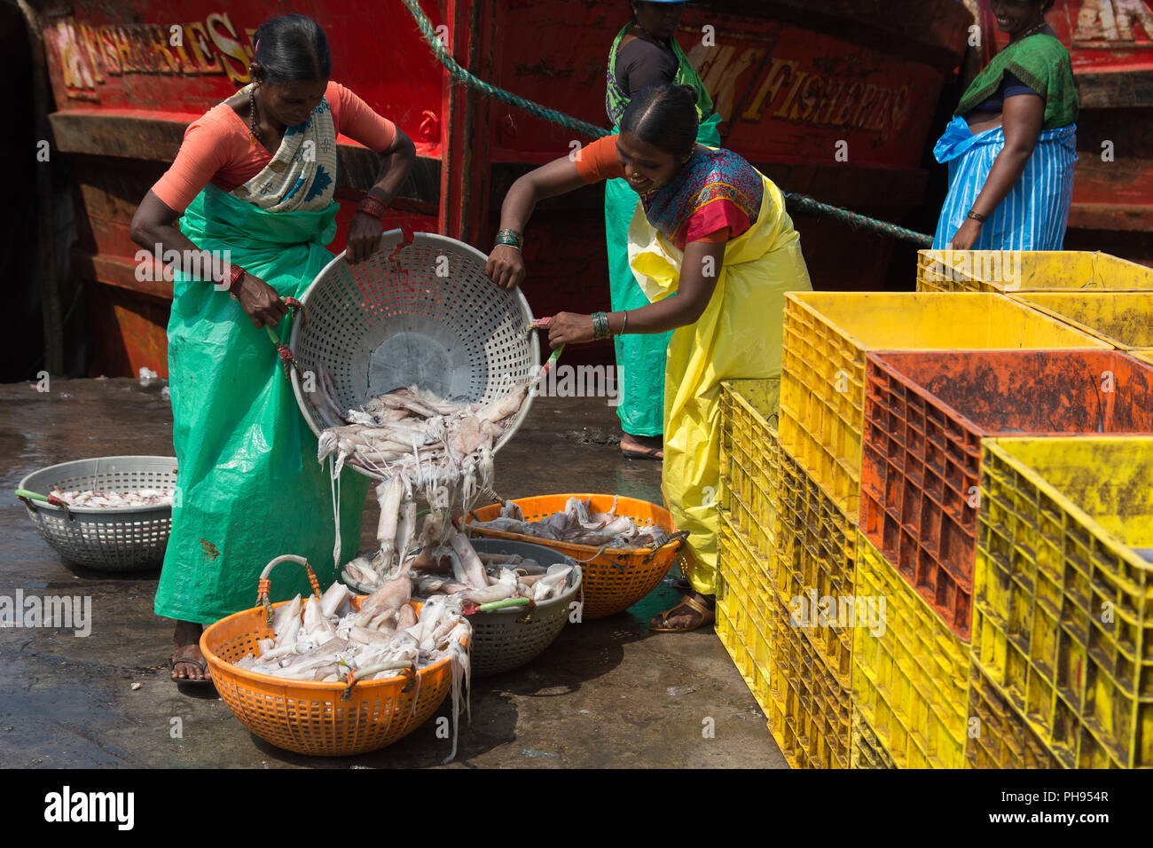 Mumbai, India July 8, 2018 Vendors on fish market unloading and