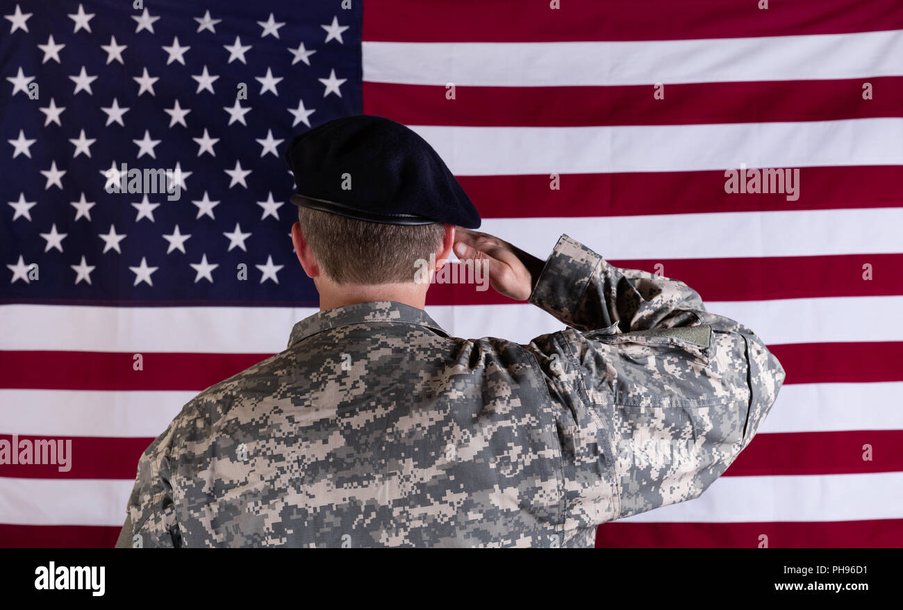 Saluting flag hi-res stock photography and images - Alamy