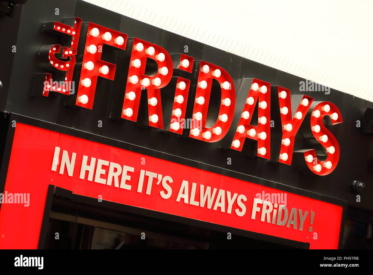 TGI Friday's sign at Leicester Square, London, UK Stock Photo
