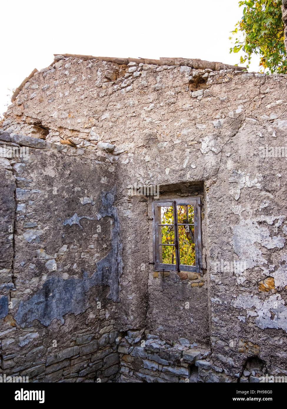 Old Abandoned Stone-built House In Old Perithia At Pantokrator Mountain 